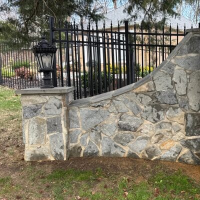 Clean exterior post lantern on stone pillar after Keenwick light cleaning service in Annapolis Maryland